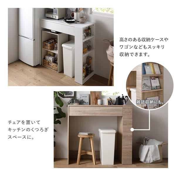高さのある収納ケースやワゴンなどもスッキリ収納できます。チェアを置いてキッチンのくつろぎスペースに。